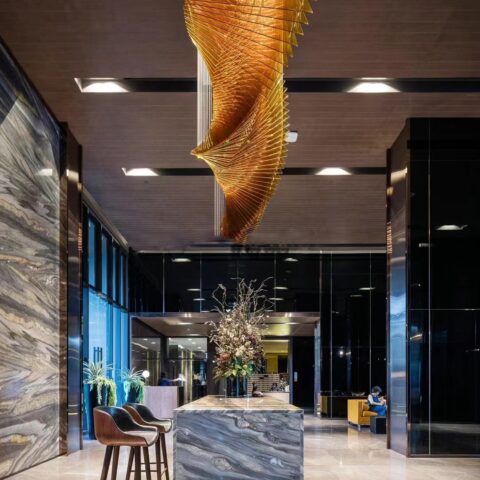 Elevate Hotel Lobbies with the DUTTI LED Large Acrylic Rotary Shape Modern Non-standard Chandelier